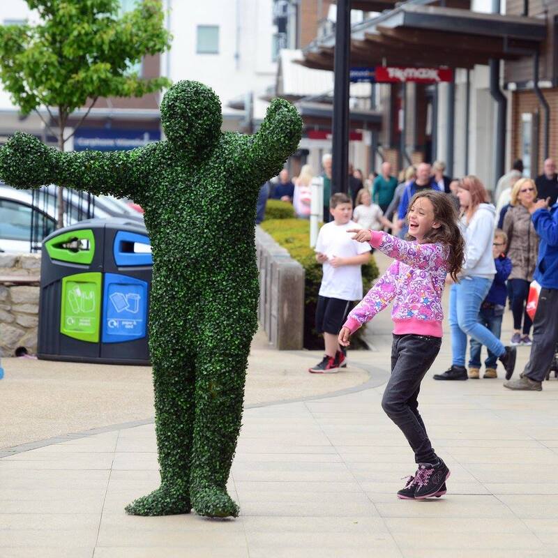 She's behind you! Hedge Man antics at a shopping centre entertainment booking.