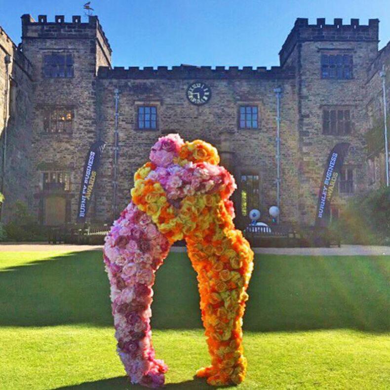 Lots of love at a corporate event with the Flower People Entertainers
