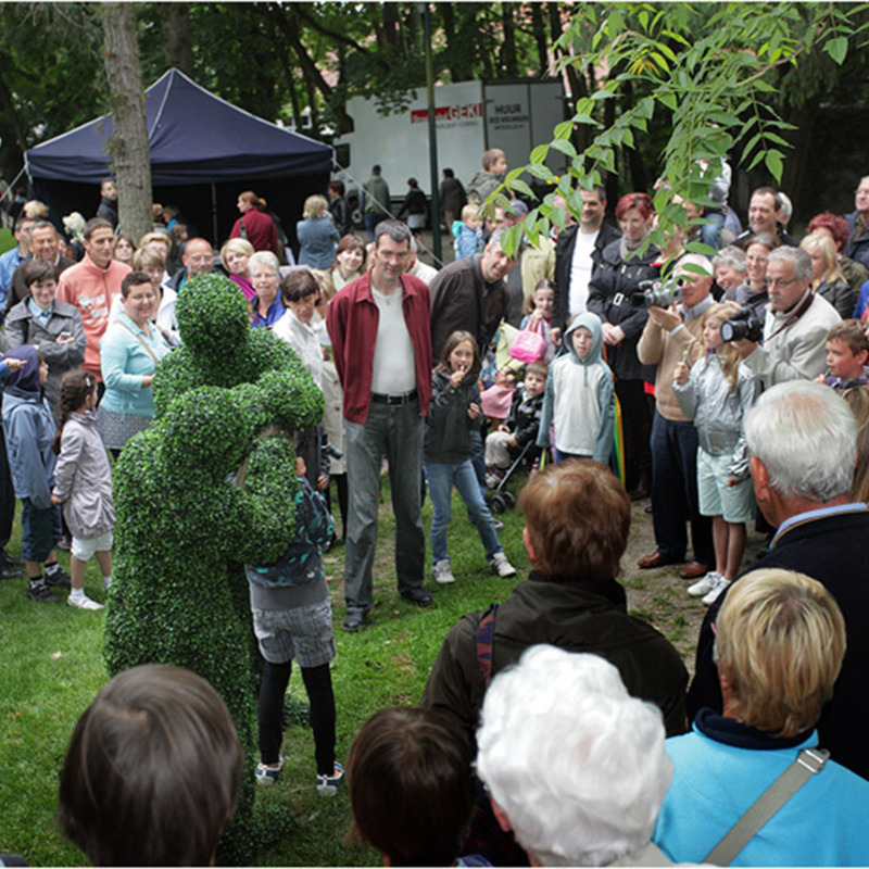 The Human Hedges drawing large crowds at a park festival in Belgium.