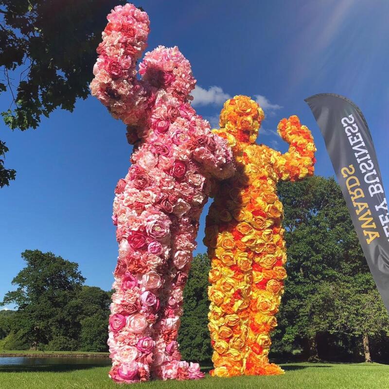 The Flower People meeting and greeting guests at a corporate awards event in Burnley.