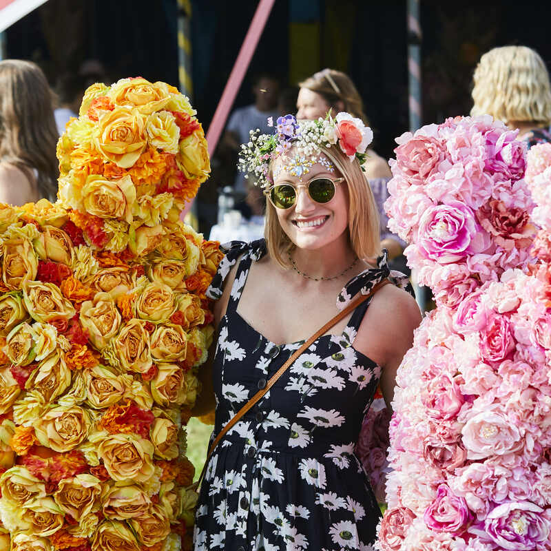 The Flower People posing with a guest at the Soho House Festival.